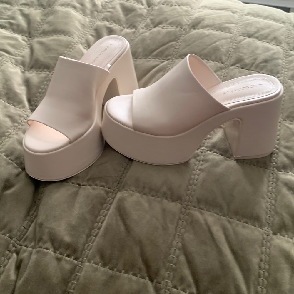 Never worn, brand new platform sandle